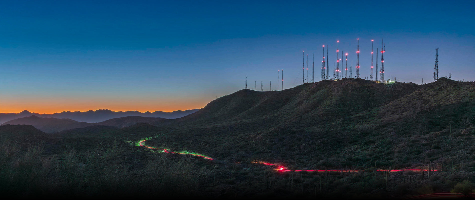 House with TV antenna at sunset