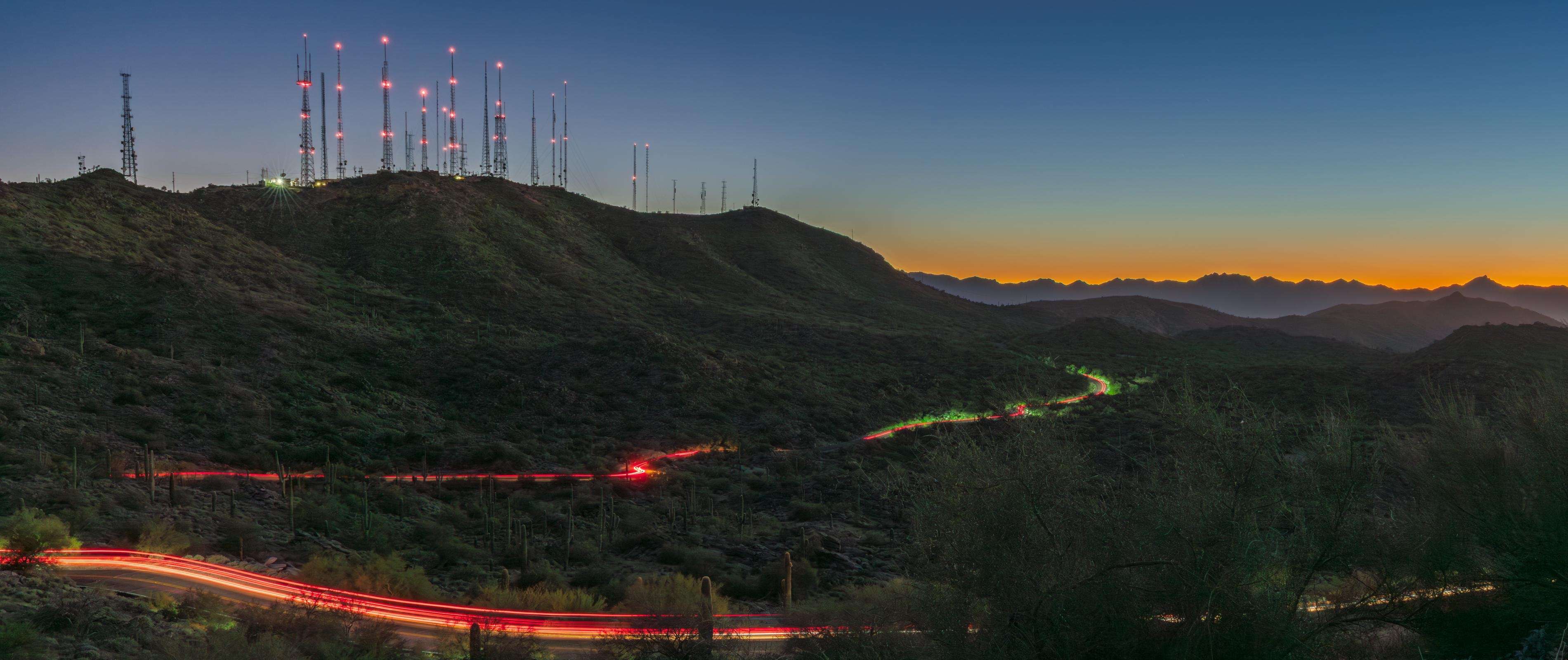 House with TV antenna at sunset