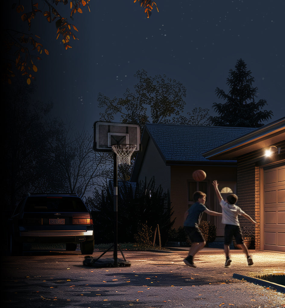 Kids playing basketball under Pro-Floodlight